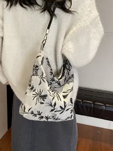 Modern Chinese style floral embroidered canvas shoulder bag with black leaf patterns