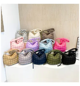 Macro display of twelve quilted cloud bags featuring soft padding and adjustable straps