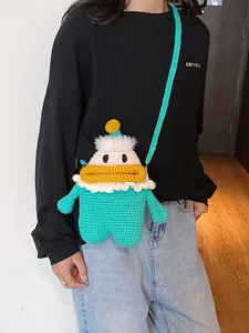 Borsa a tracolla Babbo Natale all'uncinetto fatta a mano in verde menta per bambini carina