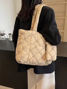 Stylish beige quilted tote bag with floral embroidery and large capacity for daily commuting