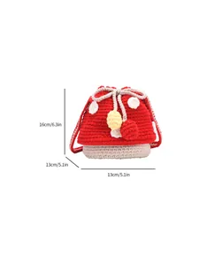 Cute mushroom-shaped crochet bucket bag with red and white polka dots and size markings