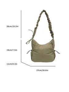 Minimalist olive green padded cotton shoulder bag with scrunchie strap and drawstring details