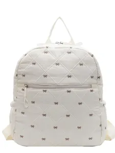 Quilted beige backpack with brown bow embroidery and spacious front zipper pocket