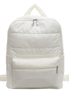 Minimalist white quilted puffer backpack with large capacity and silver metal zipper details