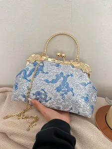 Vintage Chinese bridal handbag with blue embroidery, dragon patterns and golden handle