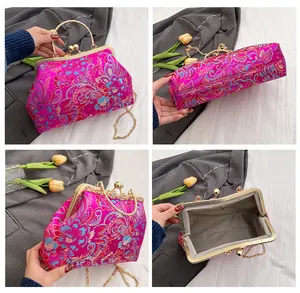 Detailed four-angle view of magenta embroidered bag showing interior and golden clasp