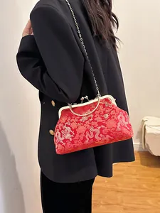 Vintage red Chinese bridal clutch with gold dragon embroidery and silver chain strap