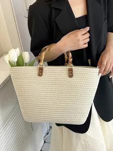 French straw tote bag with bamboo handles and cream woven texture for beach vacations