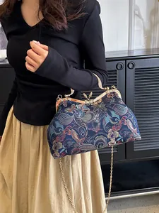 Embroidered floral shell bag with golden chain and butterfly clasp for women