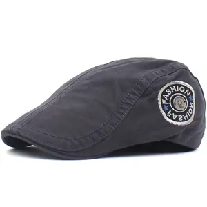 Men's navy blue cotton duckbill cap with fashion embroidery badge on white background