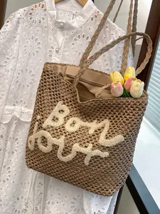 Hollow straw tote bag with Bonjour embroidery for beach summer vacation style