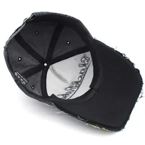Inside view of vintage washed charcoal baseball cap with frayed edges and embroidery