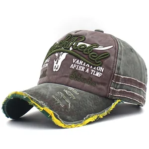 Detail of vintage washed baseball cap with frayed edges and RockRebel embroidery