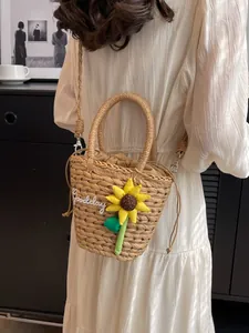 Straw woven bucket bag with sunflower decor and Goodday text for summer vacations