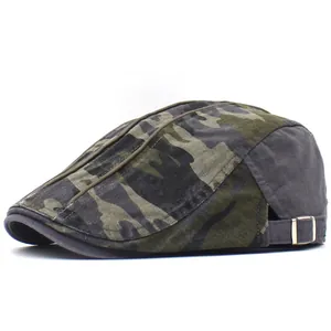 Detail of adjustable metal buckle and camouflage cotton fabric on men's beret hat