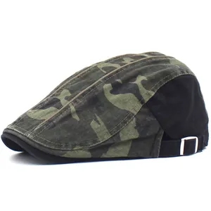 Detail of green camouflage cotton beret featuring a silver metal adjustable buckle strap
