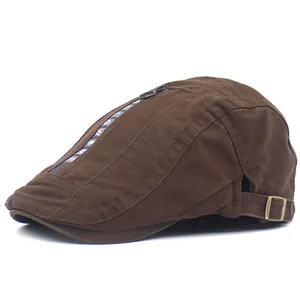 Detail view of cotton flat cap featuring decorative zipper and FOLLOW & ME lettering
