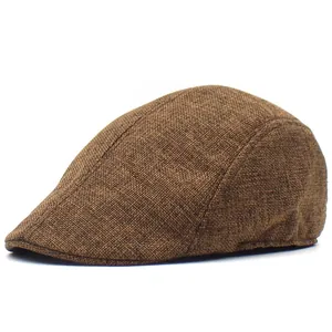 Side view of brown mesh beret showing breathable woven texture and flat cap profile