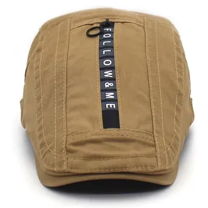 Khaki cotton beret hat for men with FOLLOW & ME text and decorative metal zipper