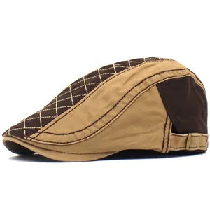 Detail view of cotton flat cap featuring diamond stitching and adjustable metal buckle
