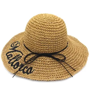 Women's raffia sun hat with Mallorca embroidery and wide brim for summer beach