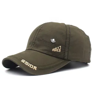 Close-up of olive cotton baseball cap featuring silver maple leaf buckle and GSIOR embroidery