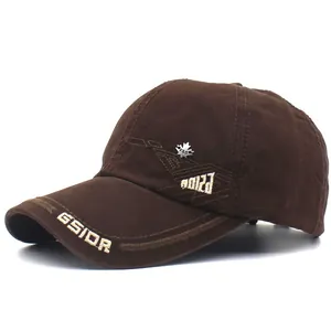 Detail view of cotton baseball cap featuring GSIOR embroidery and metal maple leaf badge