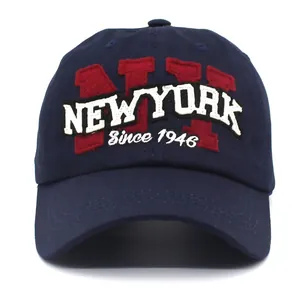 Navy blue cotton baseball cap with red NY applique and New York embroidery on front