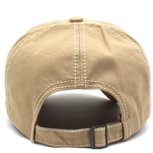 Detail of khaki cotton baseball cap showing white contrast stitching and adjustable metal buckle