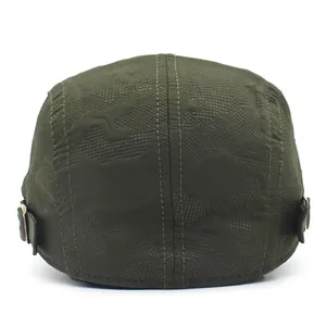 Detail of army green breathable mesh cap back with camouflage texture and metal buckle