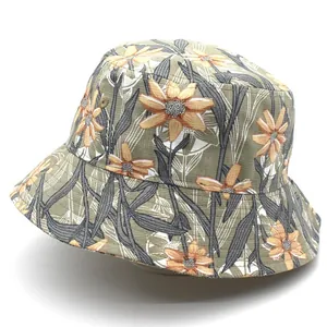 Close-up of vibrant sunflower print and stitching on canvas bucket sun hat