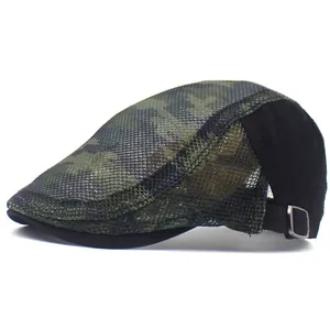 Close-up of camouflage mesh beret featuring adjustable metal buckle and breathable fabric