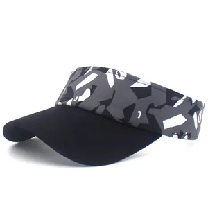 Detail of a black sun visor with grey geometric camo pattern for outdoor sports