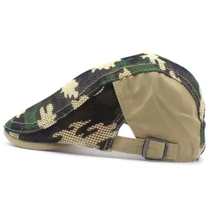 Detail of adjustable metal buckle and breathable mesh fabric on camouflage beret hat