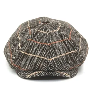 Retro grey herringbone newsboy cap with orange and beige grid pattern for women