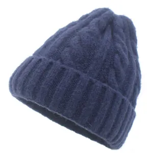 Detailed cable-knit texture and ribbed cuff of this warm navy blue winter beanie hat