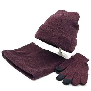 Detail of burgundy fleece-lined knit hat scarf and gloves set with touchscreen fingertips