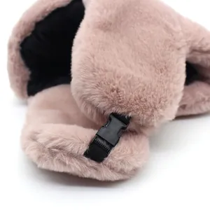 Pink winter faux rabbit fur trapper hat with adjustable ear flaps and black safety buckle