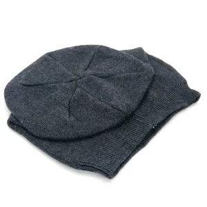 Classic dark grey knitted winter beanie for women with warm ribbed cuff and soft texture