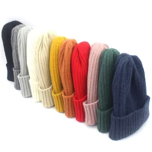 Winter ribbed knit beanies in various colors with thick cuffs and soft wool texture