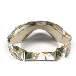 Adjustable floral pattern visor hat in light khaki with velcro back for outdoor wear
