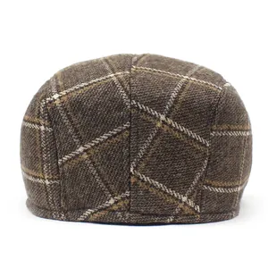 Classic brown plaid flat cap for men with retro tweed texture and autumn style