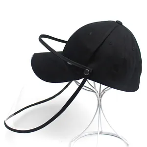 Black cotton protective baseball cap with a detachable clear shield and snap buttons