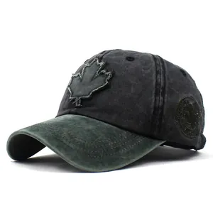 Close-up of a vintage-style maple leaf patch on a washed cotton baseball cap