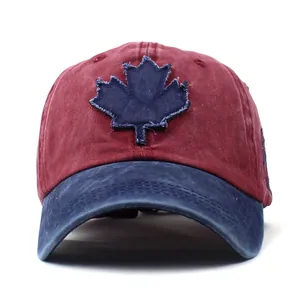 Vintage washed cotton baseball cap with maple leaf patch in red and navy contrast color