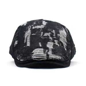 Vintage washed charcoal denim beret with distressed torn details and street style design