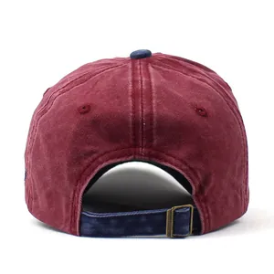 Rear view of washed cotton baseball cap with adjustable metal buckle and navy strap
