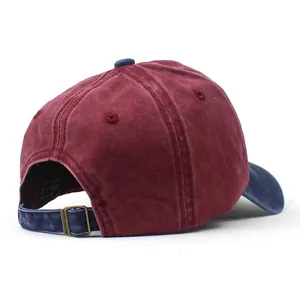 Detail of washed cotton baseball cap with bronze metal buckle and contrast color strap