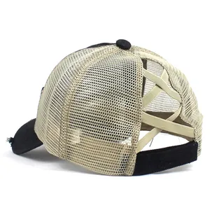 Black and beige mesh ponytail baseball cap with criss-cross elastic and distressed brim