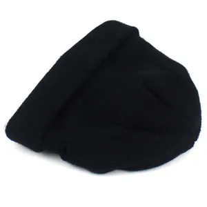 Detailed top view of a black knitted beanie with a stylish distressed finish for winter